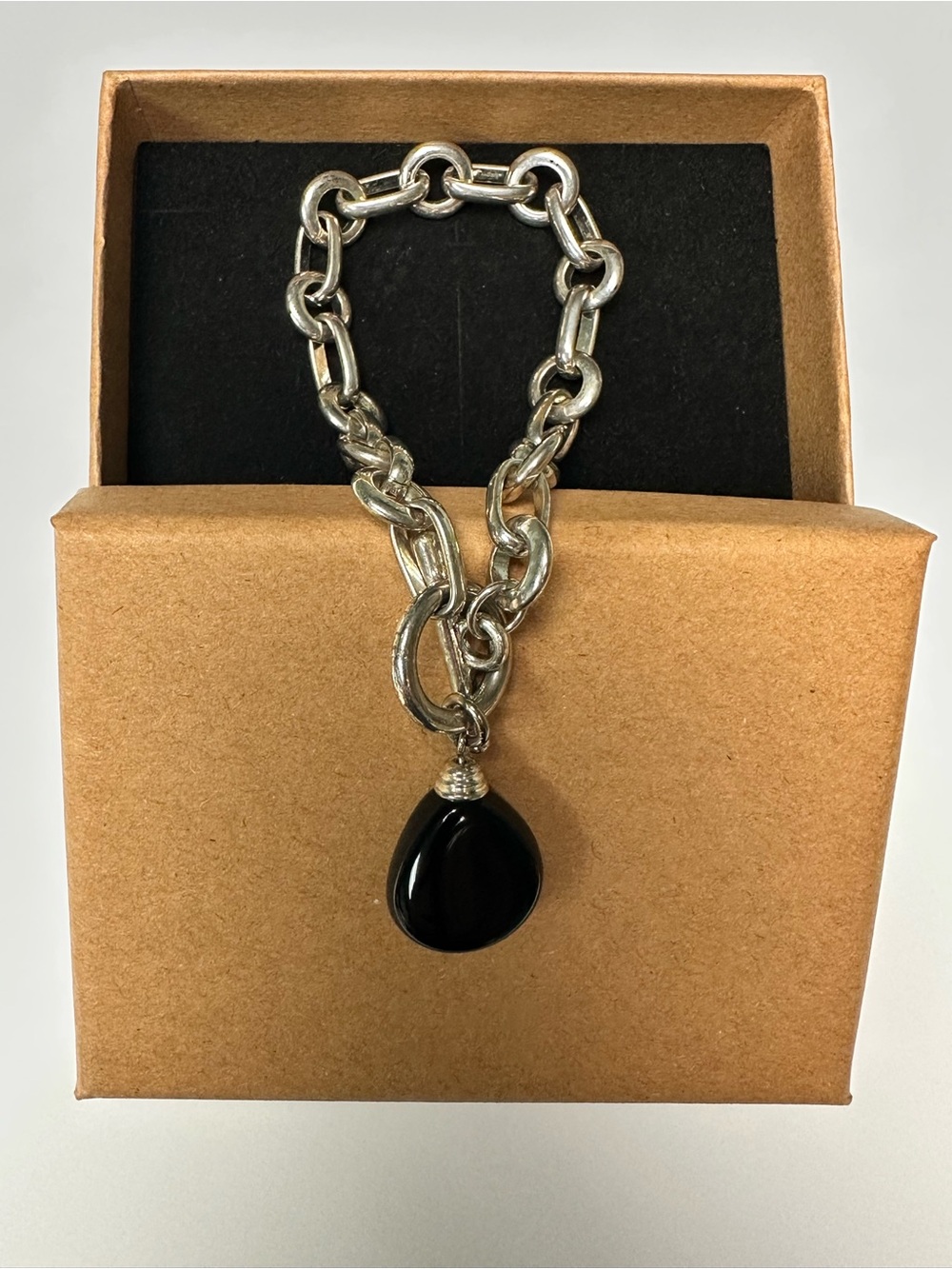 Silver Tone Link Bracelet with Black Teardrop Charm